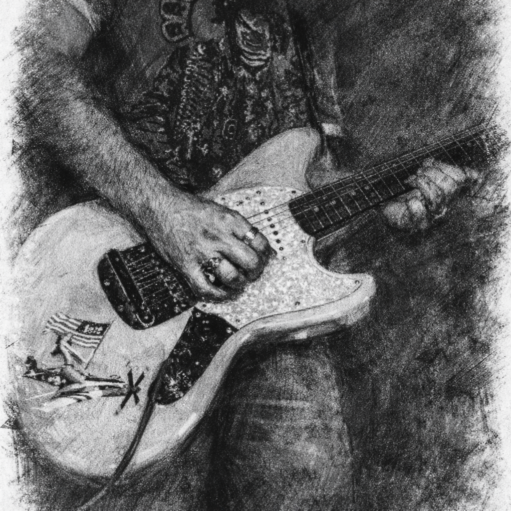 Michael Sysum playing guitar